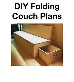 an open box sitting on top of a wooden floor with the words diy folding couch plans above it