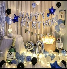 a birthday party with balloons and streamers