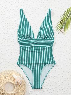 Cheap Printed One-pieces For Beach Season, Cheap Sleeveless One Piece For Beach, Cheap Solid One-pieces For Beach Season, Cheap Summer One Pieces For Poolside, Cheap One-piece Swimwear For Swimming, Cheap Vacation One-piece Swimwear, Cheap Summer One-piece For Poolside, Cheap One Pieces For Poolside In Summer, Cheap Striped Bodysuit For Vacation