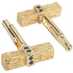 Mid-Century solid 14k yellow gold cufflinks, textured with genuine sapphires. Signed KBJC 12 round blue sapphires, approx. .24cts 14k yellow gold Stamped: 14k Hallmark: KBJC 22.2 grams Top to bottom: 7.3mm or 5/16 inch Width: 23.3mm or 15/16 Inch Depth or thickness: 5.7mm Gold Cufflinks Men, Antique Mens Jewelry, Murano Jewelry, Antique Wedding Bands, Diamond Sapphire Engagement Ring, Antique Engagement Rings Vintage, Blue Star Sapphire, Antique Bracelets, Vintage Sapphire