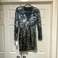 Rachel Zoe Micah Sequin Mini Dress New With Tags Final Sale Price Never Worn/ Retail Paid$499 Glamorous Luxury Brand Color Black/Silver Size 0 Classy Luxurious Sexy Cocktail Dress All Over Sequin Design Deep V Neck Front Mini Length Cinched Waist Pull Over Style Long Sleeves Closed Back Fully Lined Some Stretch Material 92% Polyester/8% Spandex Bust 16.5" Waist 13" Hips 15.5" Length 33" Sleeves 24.5" *Perfect Sexy Classy Cocktail Dress For Events/Parties/Holidays/Travel/Special Occasion * *No Tr Classy Cocktail Dress, Silver Sequin Mini Dress, Cocktail Dress Classy, Peasant Style Dress, Bianca Dress, Black Sequin Mini Dress, Linen Shift Dress, Yellow Floral Dress, Sequin Design