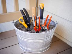 a bucket filled with lots of different types of tools