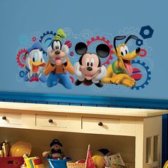 mickey mouse and friends wall decals in a children's room