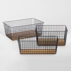 three metal baskets sitting on top of each other