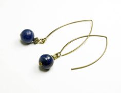 Lapis lazuli earrings (diameter : 1 cm) with long bronze colored hooks  Hook length : 4 cm (1,6 in) Bronze antique french jewelry. I sell matching jewelry in the shop. https://www.etsy.com/fr/shop/FrancoiseCreations?ref=seller-platform-mcnav&section_id=22246824 ♡Hand-made jewelry♡ without lead, without nickel. All my jewelry is lovely packaged . That would make a nice gift. They are all created by myself in my workshop near Paris, in Rueil-Malmaison. Please have a look to my shop : http://www.etsy.com/shop/francoisecreations Lapis Lazuli Earrings, French Jewelry, Blue Dangle Earrings, Vintage Headbands, Turquoise Bead Necklaces, Artisan Earrings, Blue Topaz Earrings, Matching Jewelry, Topaz Earrings