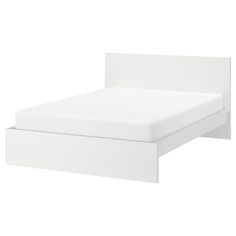 a white bed frame with two drawers