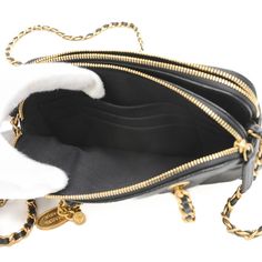 General: Brand: Chanel Design: Type: Handbag, Pochette, Shoulder bag Material: Caviar leather Color: Black Hardware Color: Matte gold Gender: Women Size: Size (HxWxD): 9.5cm x 18cm x 4cm / 3.74'' x 7.08'' x 1.57'' Included Items: Accessories: Box, Dust bag Accessories Notice: Before purchasing, please refer to the images of the accessories included with the item. Condition: Condition: Opened (never used) Ranking: Rank NS Never used / display item Seller Ranking: Rank N Overall Scratches: Insigni Black Wallet On Chain With Gold-tone Logo For Evening, Luxury Formal Bags With Gold Chain, Formal Yellow Gold Bag With Gold-tone Logo Plaque, Compact Formal Bag With Gold-tone Hardware, Formal Compact Bag With Gold-tone Hardware, Compact Formal Bags With Gold-tone Hardware, Designer Compact Bag For Formal Occasions, Formal Black Wallet On Chain With Gold-tone Logo, Elegant Gold Wallet On Chain For Business