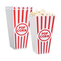 two red and white striped popcorn bags with the words pop corn on them are sitting next to each other