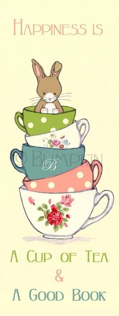 a stack of tea cups with a bunny sitting on top of each cup and the words happiness is