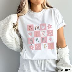 This Emergency Department Shirt / ER Nurse Comfort Colors Shirt is perfect for anyone who works in the ED! Makes a great gift! So cute and trendy and a great fit!   **UNISEX SIZING**  See more of our Emergency Department Tshirts and Sweatshirts here:  https://etsy.me/3VsWA9T ♥ W E L C O M E  T O  S K E T C H Y  C A T  D E S I G N S ! ♥ * This is a standard unisex garment-dyed 100% cotton shirt - Comfort Colors Tee with a relaxed fit. FOR AND OVERSIZED TEE, PLEASE SIZE UP!!  Please review the siz White Shirt With Funny Print For Everyday, Everyday White Shirt With Funny Print, Trendy White Shirt As A Gift, Er Tech, Emergency Nurse, Emergency Nursing, Er Nurse, Emergency Department, Comfort Colors Shirt