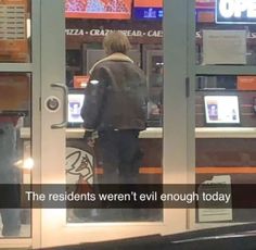 a man standing in front of a vending machine with the words, the residents weren't even enough today