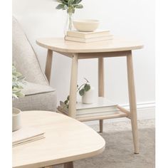 Showcase your modern-inspired style with this versatile rectangle side table. The finish also lends itself to versatile design, giving it that look of timeless decor. Solid rubberwood is used to create this stunning end table, crafting a statement that is as durable as it is beautiful. The top wooden tier of this side table is perfect for creating a lovely display area for candles, small lamps, books, and other accents. The slatted bottom tier of the Niles is great for storing your favorite hous Rectangle Side Table, Small Lamps, Display Area, Wooden Side Table, Timeless Decor, Side Table With Storage, Side Table Wood, End Table, Table Design