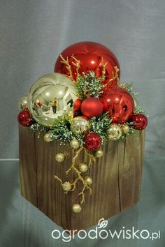 a wooden box filled with ornaments and decorations