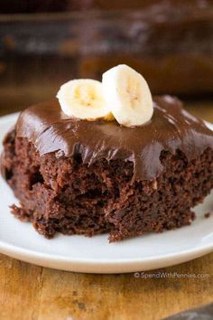 a piece of chocolate cake with bananas on top