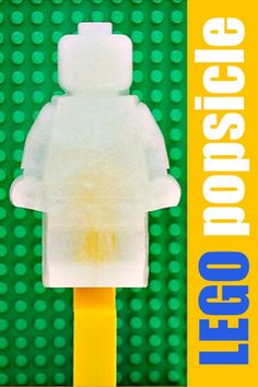 a close up of a lego figure on top of a green background with the words lego popsicle