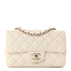 This is an authentic CHANEL Lambskin Quilted Mini Rectangular Flap in White. This chic handbag is crafted of diamond-quilted lambskin leather in white. The bag features a rear patch pocket, a leather-threaded gold chain-link shoulder strap, anda matching gold classic CC turn-lock on the crossover flap. The front flap opens to a matching leather interior with zipper and patch pockets.