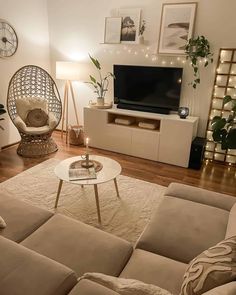 a living room filled with furniture and a flat screen tv