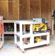 a workbench with tools on it in a room that is being built into the wall