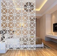 the room divider is designed to look like it has been cut out into an intricate pattern