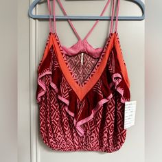 Free People Boho Tank. Very Loose Fitting. Marked Xs But Could Easily Fit A Medium Or Large. See Pics For Measurements. I’m An Xxs Or Xs And It’s Too Large For Me. Red V-neck Top For Beach Season, Red V-neck Tops For Beach Season, Red Sleeveless Beach Top, Red Summer Crop Top, Red V-neck Summer Tank Top, Red Summer Tank Top For Beach Season, Red Cotton V-neck Crop Top, Red Bohemian Tops For Beach Season, Red Bohemian Tops For Summer