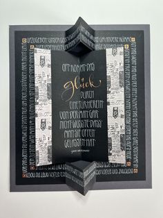 a black and white menu with gold lettering