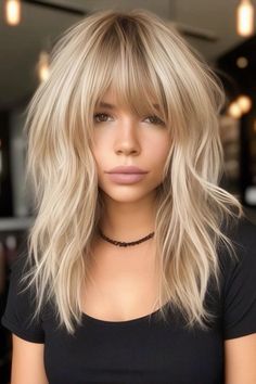 Modern Bridgette Bardot Hair, Flipped Out Hairstyles, Medium Blonde Shag Haircut, Long Shag Fine Hair, Blonde With Bangs Medium, Shag Blonde Hair, Long Bob Pony, Blonde Shoulder Length Hair With Bangs, Platinum Blonde Hair With Bangs