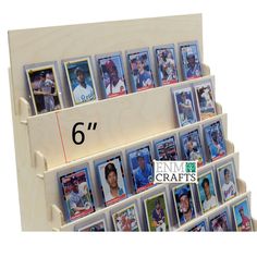 a wooden display with six different baseball cards