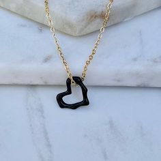 Tiny and Dainty black heart charm is a perfect everyday necklace. *Chain Length:18'  *Material: Stainless Steel chain and charm. *All items are nicely packed ready to gift. * It's best to keep away from chemical products and keep it away from lotion and perfume. Visit my Etsy store: https://etsy.me/3h5E6qy Follow me on Instagram  https://instagram.com/aguadoradadesign?igshid=YmMyMTA2M2Y= Black Double Heart Necklace For Valentine's Day, Black Heart Necklace For Valentine's Day, Valentine's Day Black Double Heart Necklace, Black Heart-shaped Jewelry With Adjustable Chain, Black Heart-shaped Jewelry For Gifts, Black Heart-shaped Jewelry Gift, Black Heart Pendant Necklace With Heart Charm, Black Heart Shaped Jewelry With Adjustable Chain, Trendy Black Heart Necklace For Valentine's Day