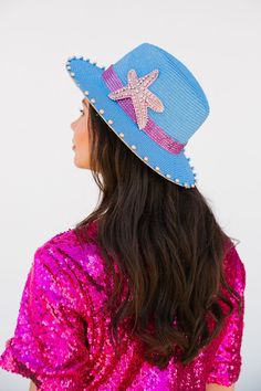 Add a touch of sparkle and whimsy to your beach days with the UNDER THE SEA SUN HAT. This blue sun hat features a gorgeous purple rhinestone band and a playful pink rhinestone starfish patch. Keep the sun out of your eyes and turn heads with this unique and stylish hat!(Don't forget to pack your sunscreen!) This hat is ONE OF A KIND, created by our owner Stephanie. To receive item quicker, expedited shipping is available at checkout. Suns Out, Purple Rhinestone, Stylish Hats, Pink Rhinestones, Beach Days, Sun Hat, Under The Sea, Beach Day, Sun Hats