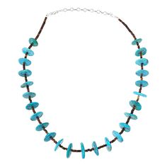 Chaco Canyon Kingman Turquoise and Heishi Shell Beaded Necklace Black heishi shell and blue turquoise draw the eye and create eye-catching contrast on this meticulously handcrafted necklace. Treat yourself to distinctive jewelry you'll build your favorites around.          Approx. 20"L x 3/16"W with 3-1/2" extender      Stamped .925 sterling silver; polished, oxidized finish     Oval-link extender: fish-hook closure     Handcrafted     Designed and Crafted in the USA   Stone Information       All sizes and weights approximate     Stabilized Kingman Turquoise: Disc (15-20mm)     Stabilized Black/Brown Heishi Shell: Rondelle (1x3-4x2mm) Shell Beaded Necklace, Chaco Canyon, Beaded Necklace Black, Shell Beads Necklace, Southwest Jewelry, Kingman Turquoise, Handcrafted Necklace, Necklace Black, Shell Beads