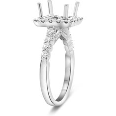 a white gold engagement ring with three stones on the side and an arrow shaped band