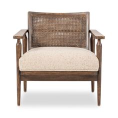 the arm chair is made out of wood and has a beige upholstered seat