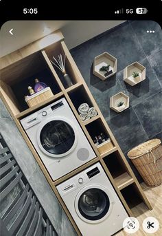 an overhead view of a washer and dryer in a room with grey walls