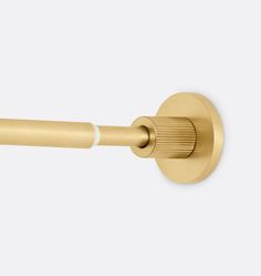 an image of a gold toilet roll holder