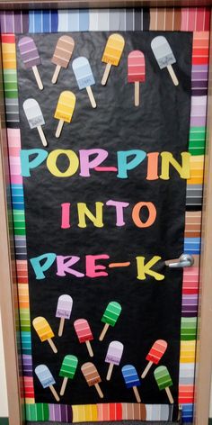 a blackboard with popsin'into pre - k written on it in rainbow colors