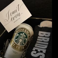 a starbucks cup and socks in a box