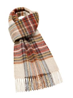 "Otley Rust Scarf Made from 100% Pure Merino Lambswool the finest available species of Lambswool giving a soft and luxurious feel to the product. Seen here is the Otley Rust Scarf Approximate size including fringe 10\" x 75\" (w x l) MADE IN ENGLAND This product is manufactured by Abraham Moon & Sons Ltd who have been producing quality wool products at their mill in Yorkshire, England since 1837. This is one of the last remaining vertical mills in England and it has been operating since the end Teal Scarf, Wool Products, Plain Scarves, Plaid Throw Blanket, Xmas Wishlist, Cowl Knitting Pattern, Tartan Scarf, Plaid Throw, Infinity Dress