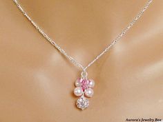 "Details: ~ Rhodium-plated brass and Egyptian crystal, pink ~ Swarovski Crystal Pink Pearls ~ Swarovski Crystal Rose Bicones ~ Sterling Silver Chain ~ Measurements: 16\" * My jewelry is handmade and made to order * Please allow 1-2 weeks for large/custom orders to be completed * Beautiful Bridal Necklace and Wonderful Gift for your Bridal Party * Matching Earrings Are Also Available (click the link below) * Jewelry will come in a gift box ready for gift giving: either customized or standard. Ple Pink Bling Necklace For Gift, Pink Rhinestone Jewelry For Gifts, Pink Crystal Dangle Necklaces, Pink Sparkling Stones Necklace For Anniversary, Pink Rhinestone Pendant Jewelry, Pink Crystal Necklace, Pink Crystal Earrings, Suffolk Va, Pink Pearls