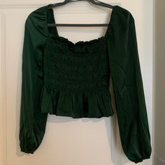 Size S Nwot. Such A Pretty, Dark Green Color. Has Cinching Throughout The Top And At The End Of The Sleeve. From Lane 201 Boutique. Cropped Fit Fitted Green Smocked Top With Long Sleeves, Green Top With Smocked Bodice For Brunch, Green Smocked Bodice Top For Brunch, Green Long Sleeve Top With Smocked Bodice, Lane 201, Dark Green Color, Long Sleeve Crop, Long Sleeve Crop Top, Green Color