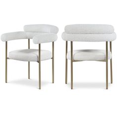 two white upholstered chairs, one with gold legs and the other without arms