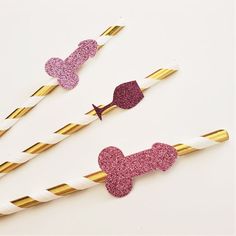 three pink and gold glitter dog head straws