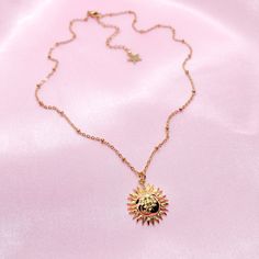 "This listing is for a resizable 18k gold plated sun charm necklace with gold plated stainless steel chain. Necklace is 16.5\" with a 2.5\" extension, max length is 19\". Great for layering!" 14k Gold Necklaces With Sun Design, 14k Gold Sun Design Necklaces, 14k Gold Sun Design Necklace, Celestial Style Charm Necklace With Adjustable Chain, Gold Plated, Tarnish Resistant 14k Gold Filled Gold-tone Charm Necklaces, Everyday Gold Jewelry With Sun And Moon Design, Gold Sun-shaped Jewelry For Everyday, Gold Celestial Sunburst Jewelry, Tarnish Resistant Yellow Gold Charm Necklace In Stainless Steel