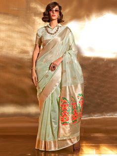 Many popular designers have chosen the pista green color tissue silk saree with zari weaving work to bring elegance and glamour to the forefront of fashion.
This gorgeous pista green zari weaving silk event wear saree with blouse is a stunning addition to any wardrobe, perfect for weddings, festivals, and other special occasions.
Measuring 5.50 meters, the saree provides ample fabric for graceful draping, complemented by unstitched blouse material for personalized customization.
The gorgeous pis Tissue Fabric, Grey Saree, Pista Green, Purple Saree, Sea Green Color, Party Sarees, Tissue Saree, Indian Wedding Wear, Ready To Wear Saree