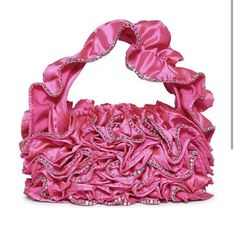 Add some flair to your outfit with this beautiful Betsey Johnson Frill Of It All shoulder bag. This stunning bag features a glossy frill pattern with rhinestone accents and a pink exterior color. The top handle is pink and made of polyester while the hardware is silver and made of stone material. The bag has a rectangle shape with a magnetic closure and is perfect for a wedding or party occasion. The bag dimensions are 10 inches in width, 7 inches in height, and 3 inches in depth, making it a small-sized shoulder bag. The interior lining is made of pink nylon and the bag is part of the Frill product line. Glamorous Pink Evening Bag With Rhinestones, Chic Pink Rhinestone Shoulder Bag, Formal Pink Shoulder Bag With Rhinestones, Glamorous Pink Shoulder Bag For Evening, Glamorous Pink Shoulder Bag For Formal Occasions, Glamorous Pink Evening Shoulder Bag, Frill Pattern, Betsey Johnson Clothes, Shoulder Bag Pink