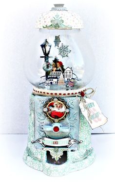 an old fashioned snow globe with christmas decorations