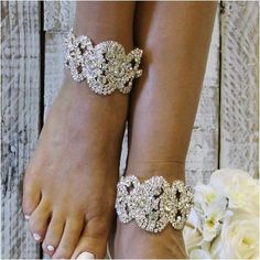 Tatiana silver rhinestones wedding ankle bracelet for Brides Our stunning rhinestone wedding ankle cuff were inspired by the royal family jewels. Feel Royal wearing these silver rhinestone wedding ankle bracelet. One of many new styles form our "ROYAL" barefoot jewelry collection one size fits most women ankle up to 11" if you need larger contact me and I will add more chain Chain extender in back to adjust to multiple sizes All barefoot sandals are sold in pairs. IN STOCK FOR QUICK SHIPPING 1-3 Royal Family Jewels, Pearl Ankle Bracelet, Silver Bridal Jewellery, Bridal Anklet, 2025 Wedding, Bracelets Women, Family Jewels, Rhinestone Bridal, Rhinestone Wedding