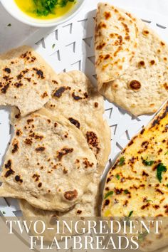 2 Ingredient flatbreads on a white tray with a bowl of parsley butter to the side. Flavoured Butter, Beef Curry Recipe, Curry Stew, Flatbread Recipe, Easy Homemade Pizza, Easy Curry, Flavored Butter, Nigella Seeds, Beef Curry