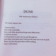 a close up of a piece of paper with writing on it and the words dune