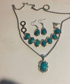 "Turquoise or Red Turquoise Silver Oval Pendant Shaped Pendant Necklace , Bracelet and Earrings Set ! Silver necklace is 20\" and has an extender ! Bracelet has a Lobster Claw Clasp Closure and is adjustable 7 Pendant is almost 1 3/4\" high including the Bale and 1 \" Wide Earrings are 1 1/2\" with the Hook. The Bracelet has a Toggle Closure and 8\" and adjustable to make smaller Your Choice Of Blue or Red This will come in a gift box ! Please feel free to ask any questions as I do not accept re Oval Turquoise Jewelry For Jewelry Making, Turquoise Jewelry Sets As A Gift, Nickel-free Turquoise Costume Jewelry, Turquoise Costume Jewelry, Elegant Metal Turquoise Necklace, Elegant Turquoise Round Jewelry Sets, Elegant Turquoise Metal Necklace, Turquoise Jewelry Set, Oval Necklace