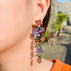 New~ Anthropologie Pave Crystal Colorful Cascading Fall Flower Earrings Elegant And Classy, A Floral Motif Features Black Metal With Orange And Purple Pave Crystal Details That Are Absolutely Stunning! Add Moody, Colorful, Sparkle To Your Evening Look. These Long, Dramatic Statement Earrings Won't Go Unnoticed! Perfect For Date Night Or Any Formal Event. Triple A Quality Cubic Zirconia Sparkles At Every Turn. Approx. 3.5"L, 1"W. Black Gun Plated, Cubic Zirconia, Post Backs Included. Nwot Anthro, Dancing Party, Bridal Accessories Jewelry, Engagement Party Wedding, Luxury Flowers, Wedding Bridal Jewellery, Girl Friend, Wedding Jewelry Earrings, Cz Earrings, Trendy Earrings